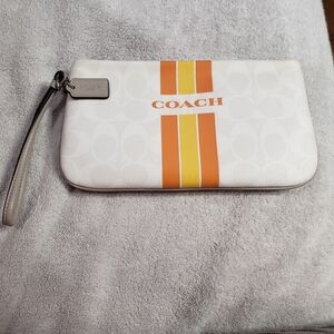Large COACH Wristlet. Chalk Color with Orange and Yellow Stripes